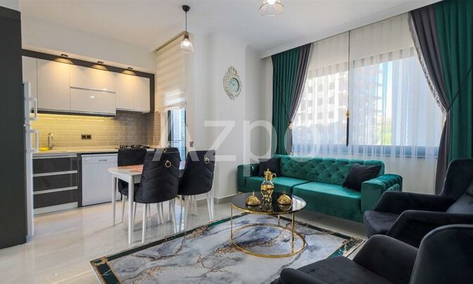 Новая меблированная квартира 1+1 в районе Махмутлар 55 м²