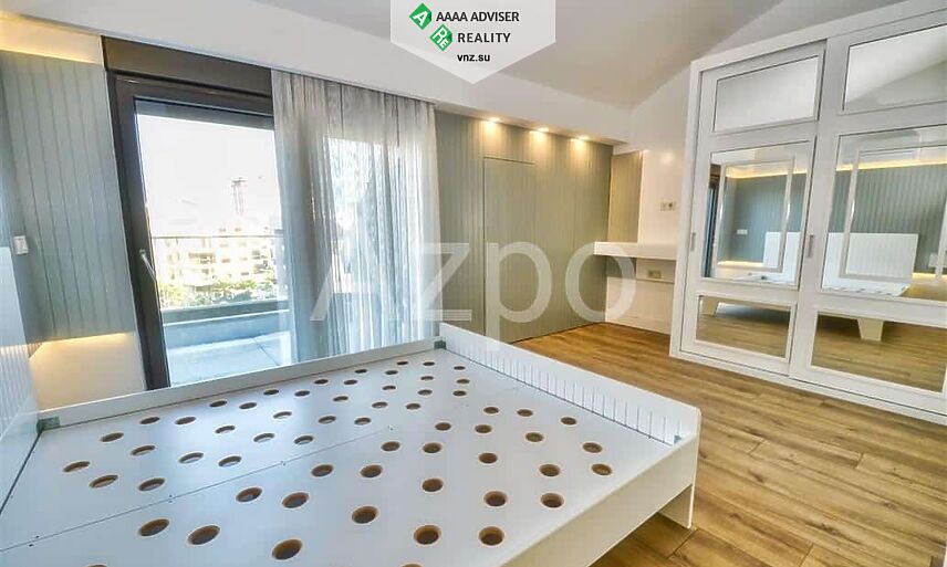 Недвижимость Турции Просторная двухуровневая квартира 4+1 с мебелью в микрорайоне Унджалы 357 м²: 12