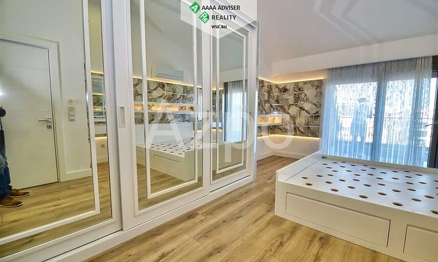 Недвижимость Турции Просторная двухуровневая квартира 4+1 с мебелью в микрорайоне Унджалы 357 м²: 14