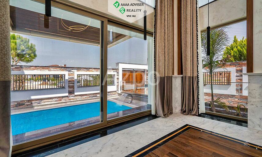 Недвижимость Турции Новая готовая вилла 6+1 в районе Дошемеалты 395 м²: 23