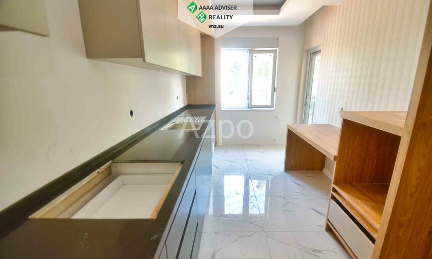 Недвижимость Турции Трёхкомнатная квартира с отдельной кухней в новом комплексе 100 м²: 12