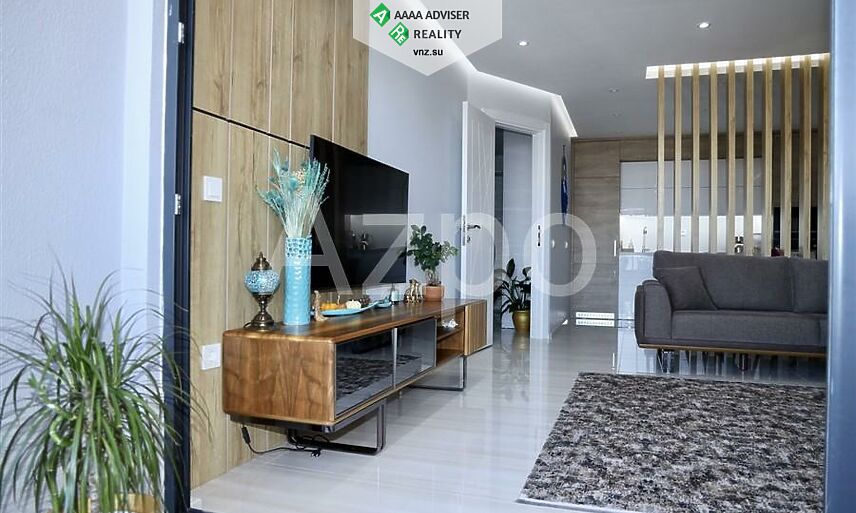 Недвижимость Турции Просторная меблированная квартира 1+1 в районе Каргыджак 65 м²: 1