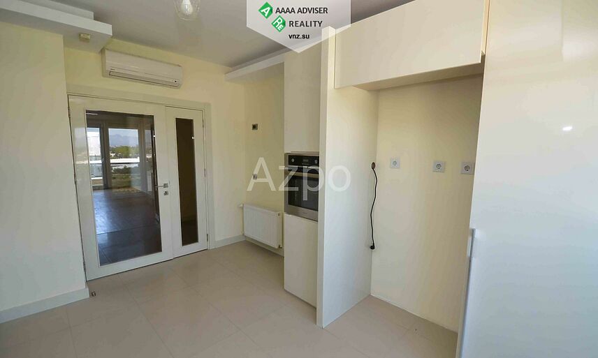 Недвижимость Турции Трёхкомнатная квартира 2+1 с отдельной кухней в районе Лара 120 м²: 23