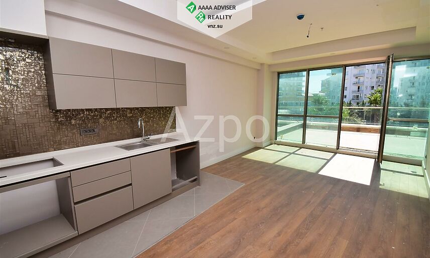 Недвижимость Турции Элитные квартиры в новом готовом комплексе 54-145 м²: 54