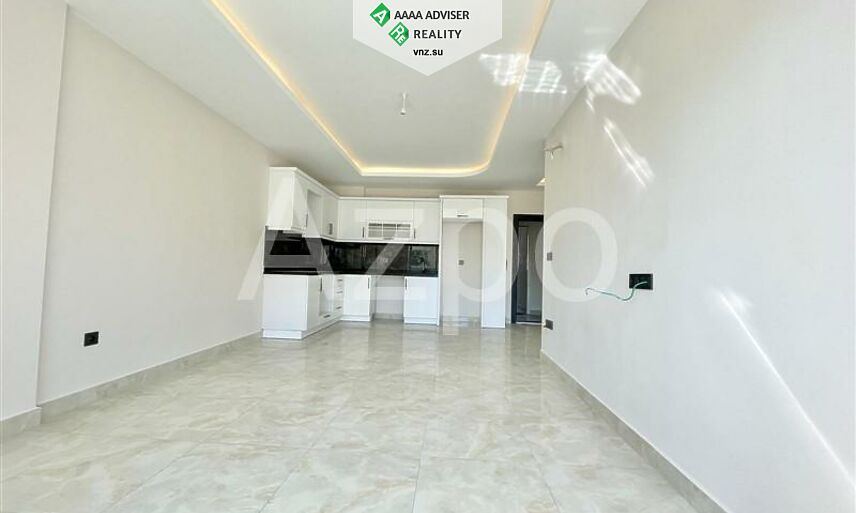 Недвижимость Турции Двухкомнатная квартира в новом комплексе с инфраструктурой 65 м²: 1