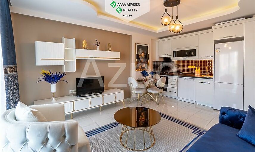 Недвижимость Турции Меблированная квартира 1+1 в районе Махмутлар 55 м²: 1
