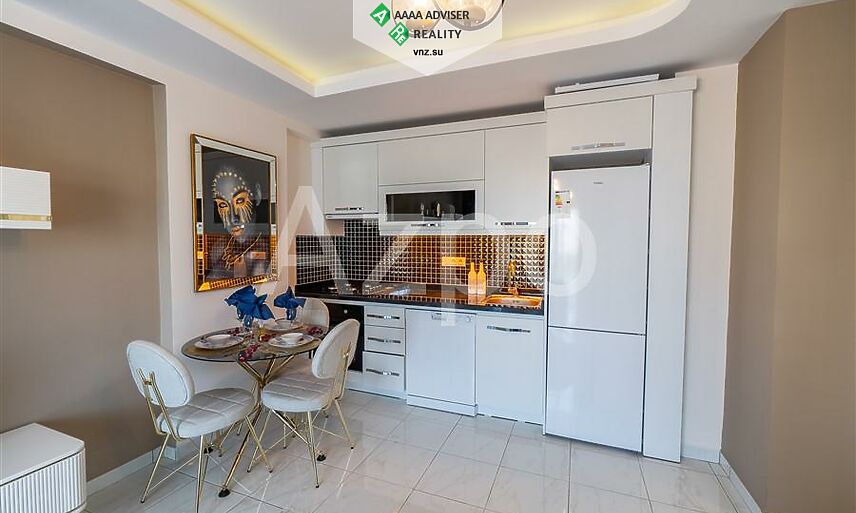 Недвижимость Турции Меблированная квартира 1+1 в районе Махмутлар 55 м²: 3