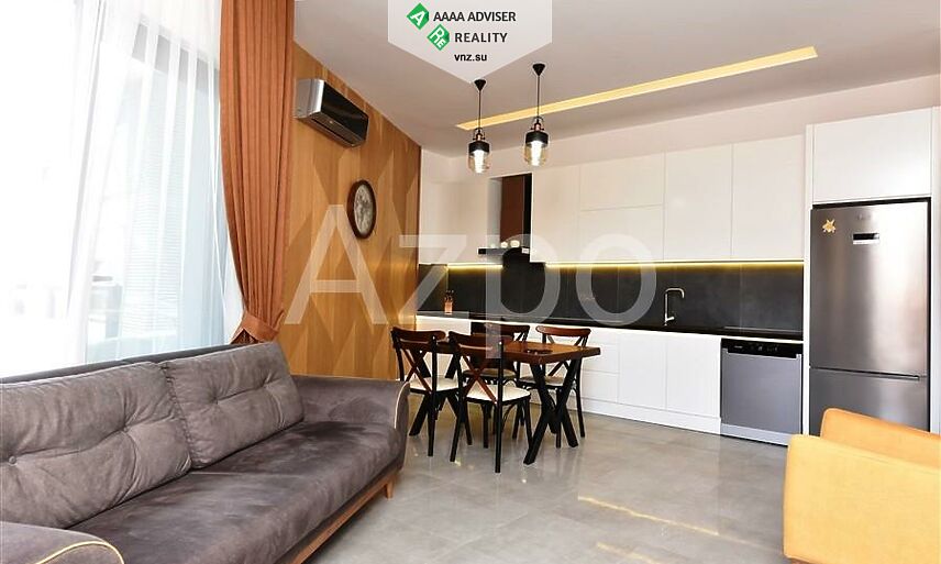 Недвижимость Турции Меблированная квартира 1+1 в районе пляжа Клеопатры 55 м²: 1