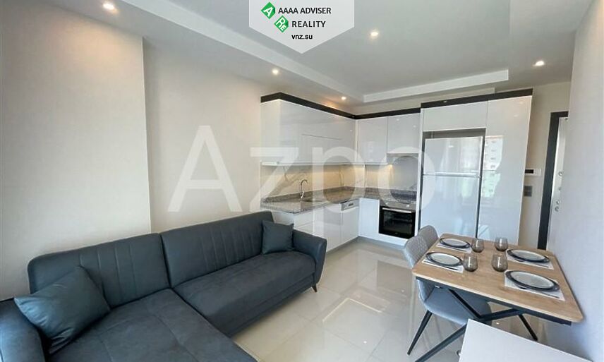 Недвижимость Турции Новая меблированная квартира 1+1 в районе Махмутлар 42 м²: 1
