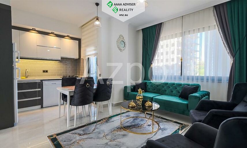 Недвижимость Турции Новая меблированная квартира 1+1 в районе Махмутлар 55 м²: 1