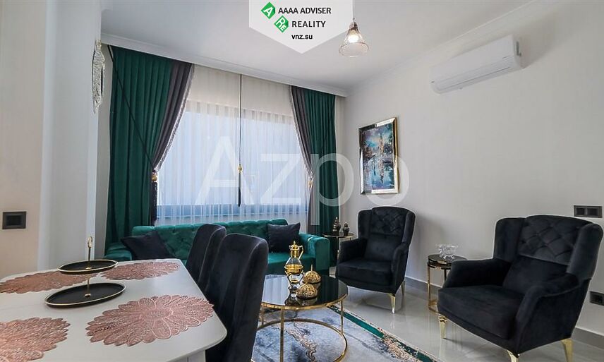 Недвижимость Турции Новая меблированная квартира 1+1 в районе Махмутлар 55 м²: 2