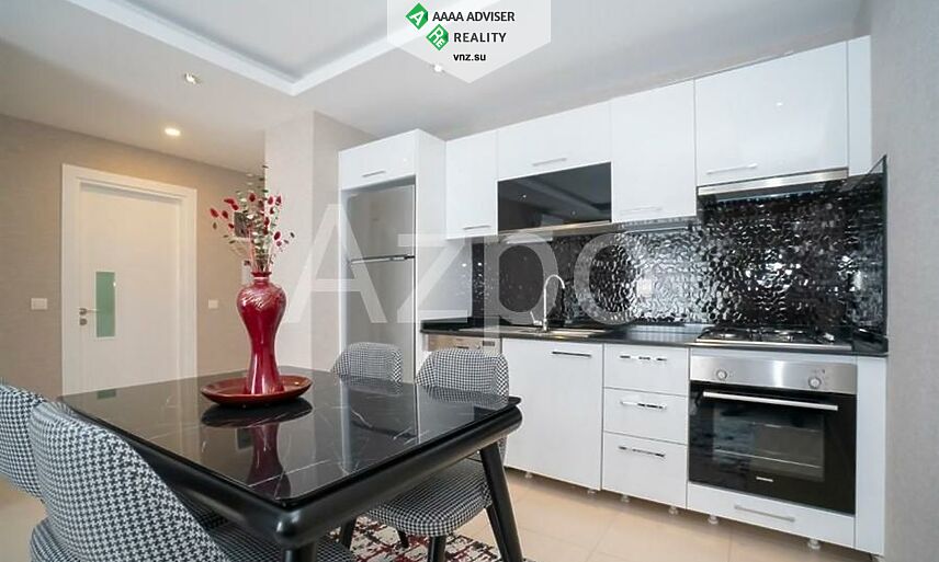 Недвижимость Турции Меблированная квартира 1+1 в элитном районе рядом с пляжем 65 м²: 4