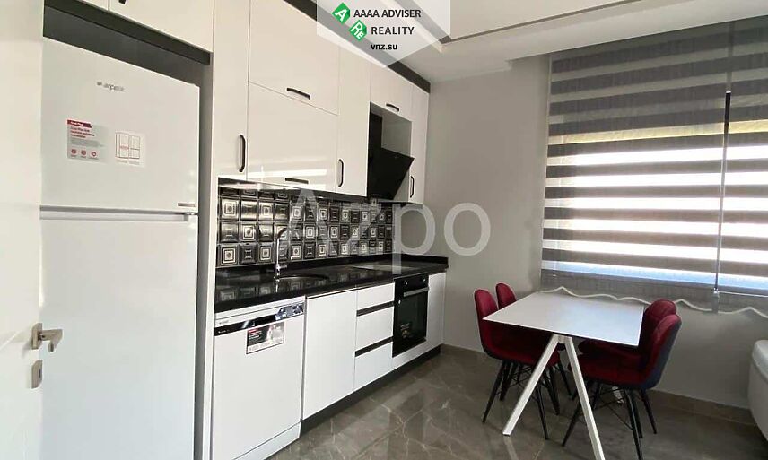 Недвижимость Турции Новая квартира 2+1 с мебелью и бытовой техникой рядом с пляжем 70 м²: 2
