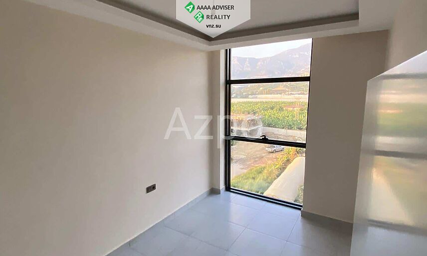 Недвижимость Турции Новая трёхкомнатная квартира с видом на Торосские горы 70 м²: 6
